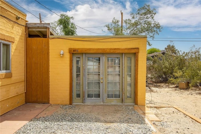 6155 Cahuilla Ave Unit 29, Palms, CA 92277 - doorway to property featuring concrete block siding