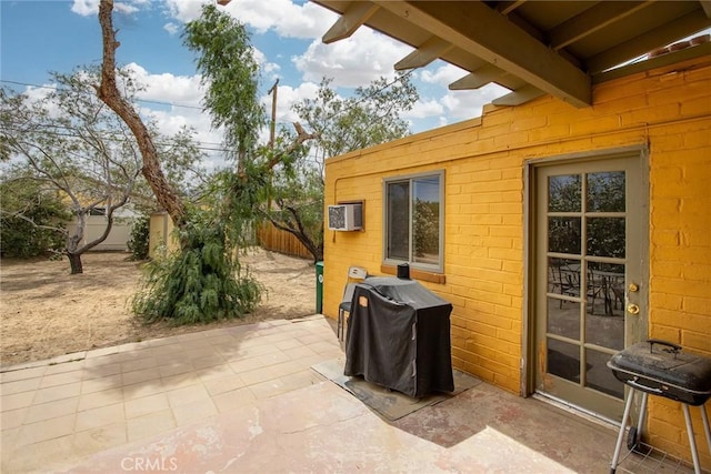 6155 Cahuilla Ave Unit 29, Palms, CA 92277 - view of patio / terrace with area for grilling and an AC wall unit