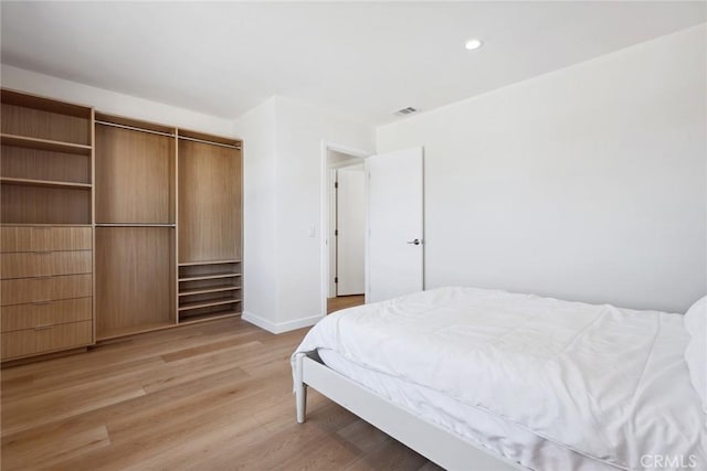 4920 Island View St, Oxnard, CA 93035 - bedroom featuring light wood finished floors, baseboards, recessed lighting, and a closet