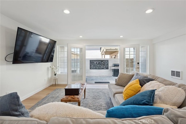 4920 Island View St, Oxnard, CA 93035 - living area featuring wood finished floors, recessed lighting, and baseboards
