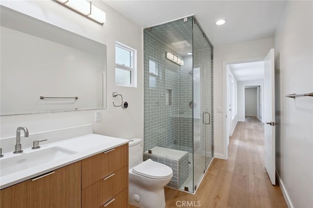 4920 Island View St, Oxnard, CA 93035 - full bath with vanity, wood finished floors, toilet, and a shower stall