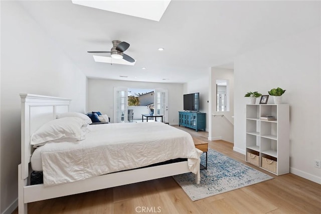 4920 Island View St, Oxnard, CA 93035 - bedroom featuring a skylight, wood finished floors, and baseboards