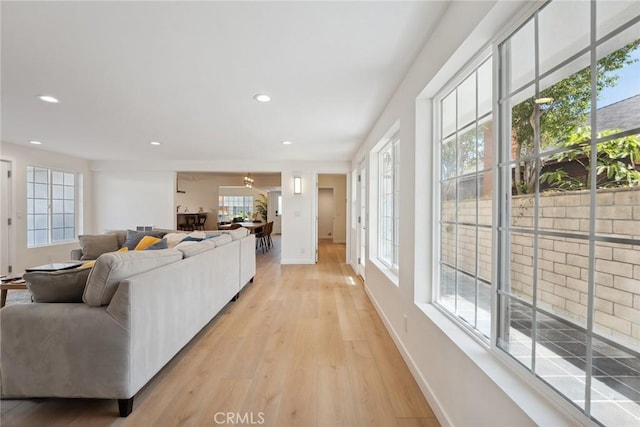 4920 Island View St, Oxnard, CA 93035 - living area with light wood-style flooring, recessed lighting, baseboards, and a chandelier