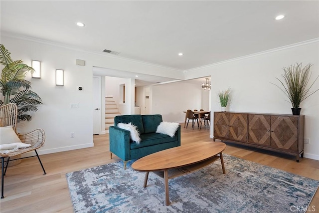 4920 Island View St, Oxnard, CA 93035 - living room with stairs, ornamental molding, light wood-style flooring, baseboards, and recessed lighting