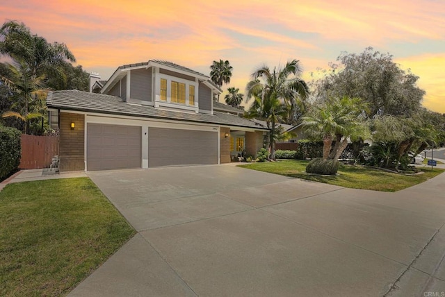 3442 Celinda Dr, Carlsbad, CA 92008 - view of front of house featuring driveway, an attached garage, and a tile roof