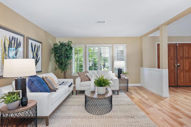 3442 Celinda Dr, Carlsbad, CA 92008 - living room with light wood-style flooring and baseboards