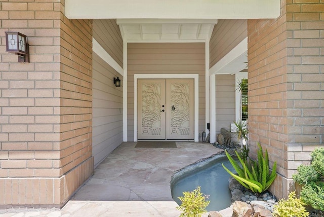 3442 Celinda Dr, Carlsbad, CA 92008 - property entrance with french doors