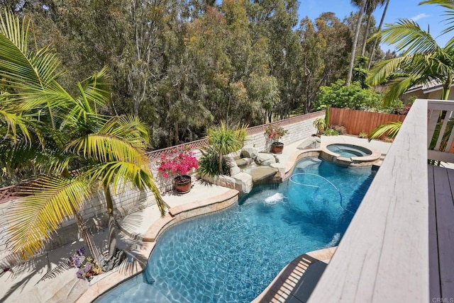 3442 Celinda Dr, Carlsbad, CA 92008 - view of pool featuring a fenced backyard, a pool with connected hot tub, a deck, and view of wooded area