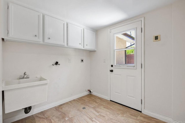 3442 Celinda Dr, Carlsbad, CA 92008 - laundry area with cabinet space and electric dryer hookup