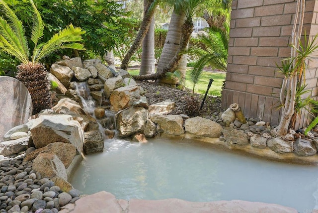 3442 Celinda Dr, Carlsbad, CA 92008 - view of swimming pool with a garden pond