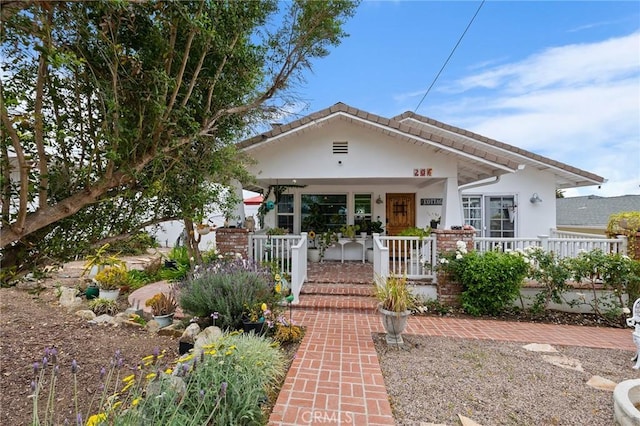 206 S Wisconsin St, Fallbrook, CA 92028 - view of front of home featuring a porch and stucco siding