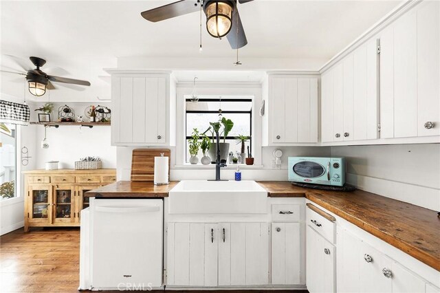 206 S Wisconsin St, Fallbrook, CA 92028 - kitchen with wooden counters, a ceiling fan, white dishwasher, and plenty of natural light