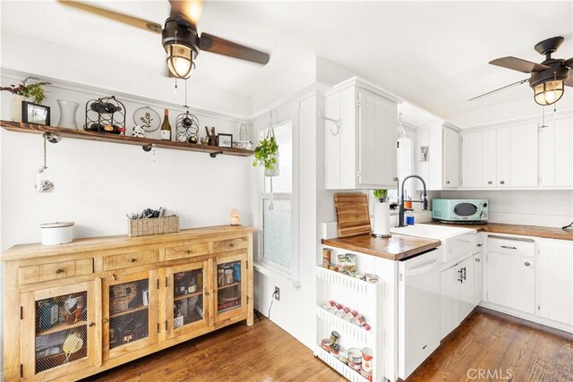 206 S Wisconsin St, Fallbrook, CA 92028 - kitchen with ceiling fan, wood finished floors, white cabinetry, and open shelves