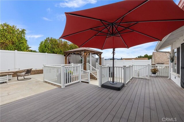 206 S Wisconsin St, Fallbrook, CA 92028 - deck featuring a gazebo, a fenced backyard, and a patio area