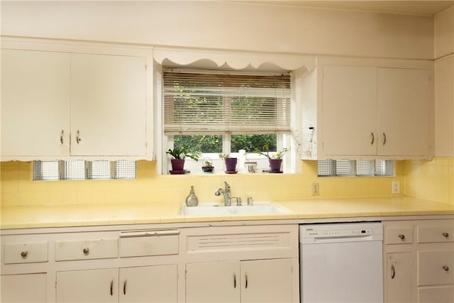 1731 Roscomare Rd, Los Angeles, CA 90077 - kitchen with dishwasher, a sink, light countertops, and white cabinetry