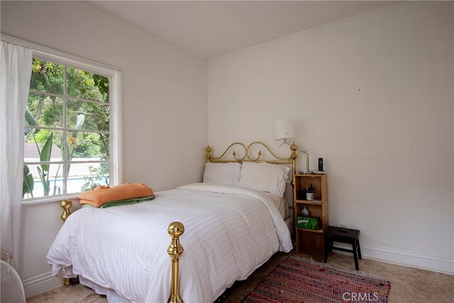 1731 Roscomare Rd, Los Angeles, CA 90077 - bedroom featuring multiple windows and baseboards