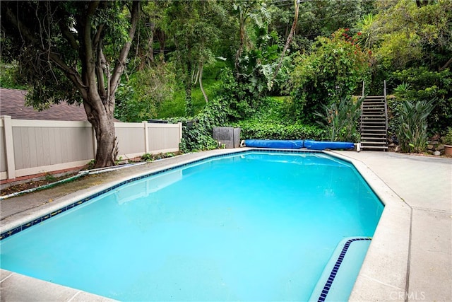 1731 Roscomare Rd, Los Angeles, CA 90077 - view of swimming pool featuring a fenced backyard