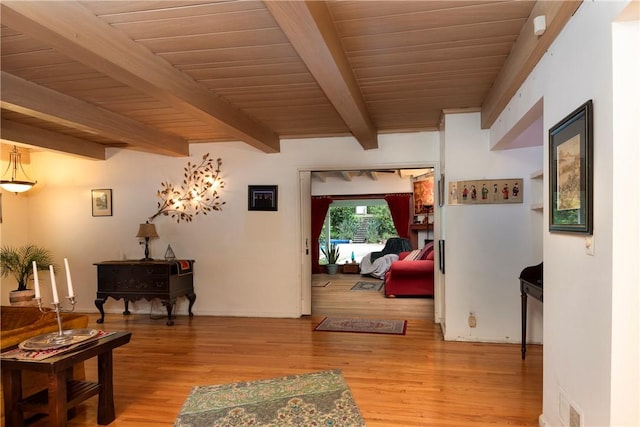 1731 Roscomare Rd, Los Angeles, CA 90077 - corridor with light wood-type flooring, baseboards, and wood ceiling with exposed beams