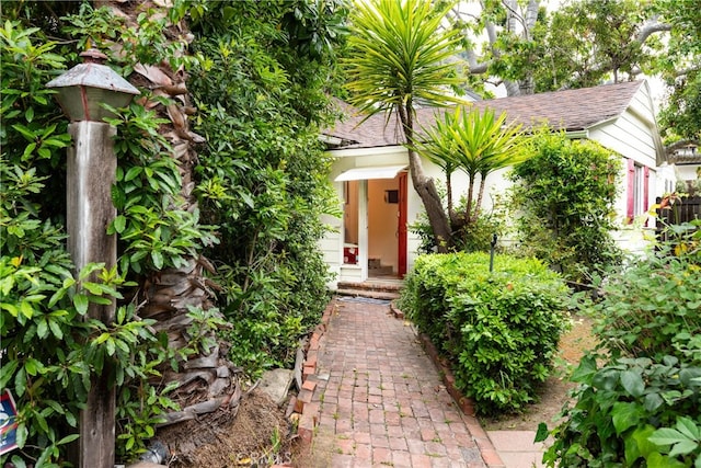 1731 Roscomare Rd, Los Angeles, CA 90077 - doorway to property with roof with shingles