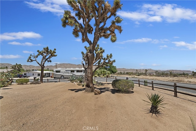 56287 Navajo Trl, Yucca Valley, CA 92284 - view of yard with a mountain view