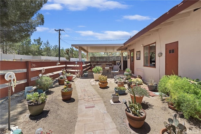 56287 Navajo Trl, Yucca Valley, CA 92284 - fenced backyard featuring a patio area