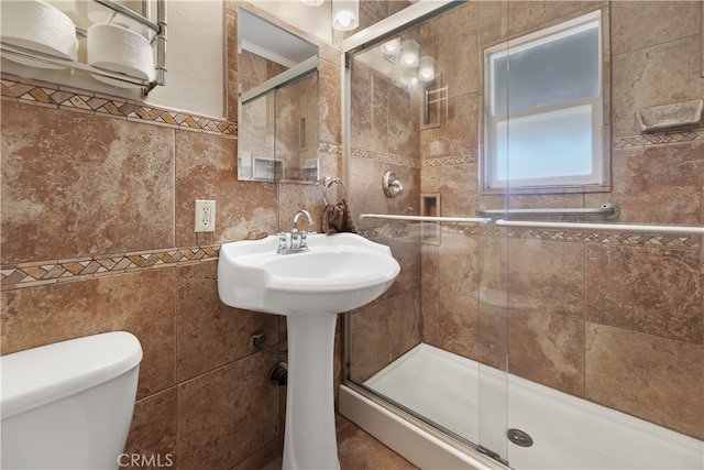 56287 Navajo Trl, Yucca Valley, CA 92284 - full bath with tile walls, toilet, and a stall shower