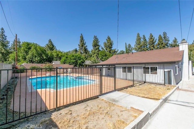 11127 Monogram Ave, Granada Hills, CA 91344 - view of pool with a fenced backyard and a patio