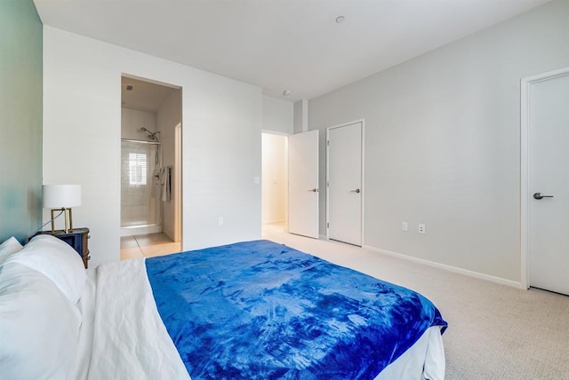 5261 Beachfront Cove St # 174, San Diego, CA 92154 - bedroom featuring light carpet, ensuite bathroom, and baseboards