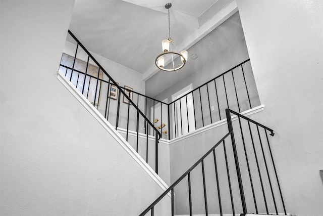 1754 Hill Top Ln, Encinitas, CA 92024 - stairs featuring a high ceiling and a chandelier