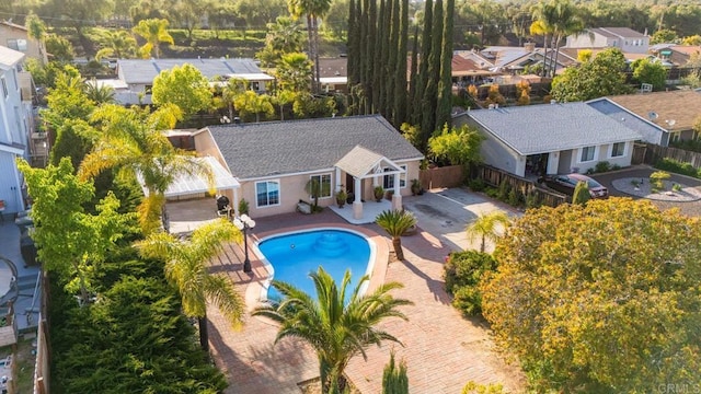 13808 Pomerado Rd, Poway, CA 92064 - view of pool featuring an exterior structure, a fenced backyard, an outbuilding, a patio area, and a residential view