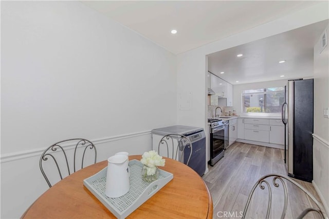 28012 Ridgeforest Ct, Rancho Palos Verdes, CA 90275 - dining space featuring light wood-style floors and recessed lighting