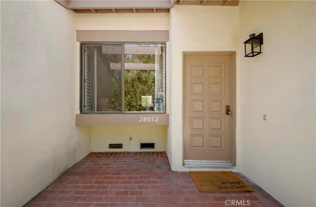 28012 Ridgeforest Ct, Rancho Palos Verdes, CA 90275 - view of exterior entry featuring stucco siding