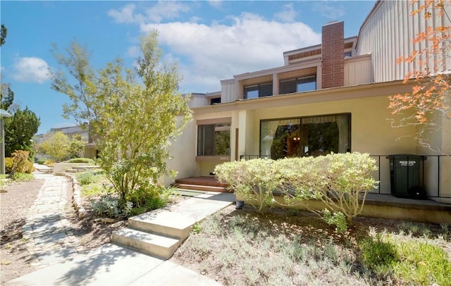 28012 Ridgeforest Ct, Rancho Palos Verdes, CA 90275 - view of front of home featuring stucco siding and a chimney