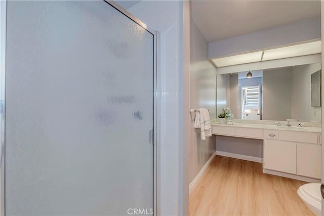 28012 Ridgeforest Ct, Rancho Palos Verdes, CA 90275 - full bath with wood finished floors, a stall shower, and vanity