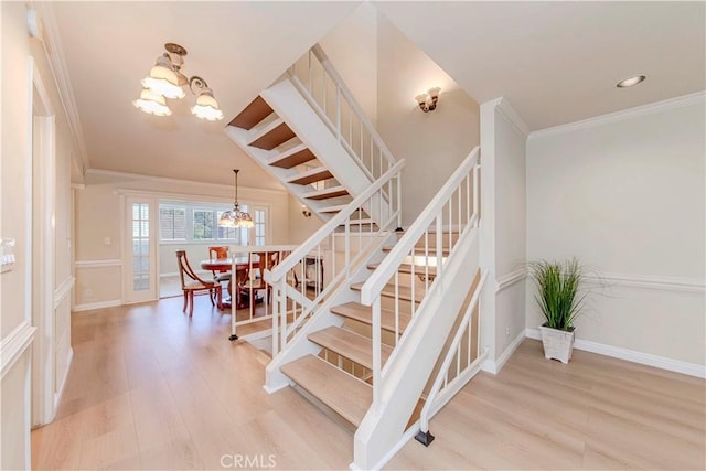 28012 Ridgeforest Ct, Rancho Palos Verdes, CA 90275 - stairway with a chandelier, crown molding, wood finished floors, recessed lighting, and baseboards