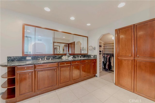28012 Ridgeforest Ct, Rancho Palos Verdes, CA 90275 - bathroom with double vanity, recessed lighting, a walk in closet, and tile patterned floors