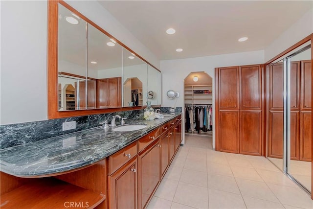 28012 Ridgeforest Ct, Rancho Palos Verdes, CA 90275 - full bathroom with vanity, recessed lighting, tile patterned flooring, and a spacious closet