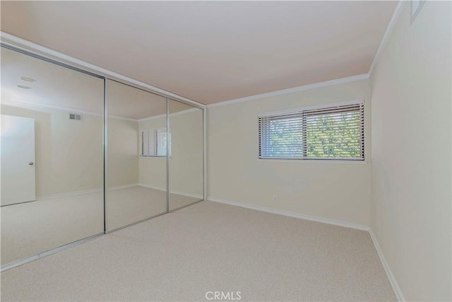 28012 Ridgeforest Ct, Rancho Palos Verdes, CA 90275 - unfurnished bedroom with carpet, ornamental molding, a closet, and baseboards