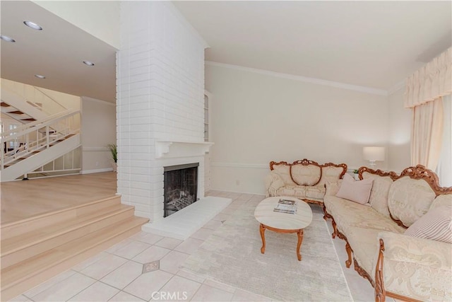 28012 Ridgeforest Ct, Rancho Palos Verdes, CA 90275 - living area with stairs, crown molding, a brick fireplace, recessed lighting, and tile patterned floors