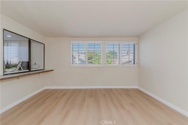 28012 Ridgeforest Ct, Rancho Palos Verdes, CA 90275 - empty room featuring light wood finished floors and baseboards