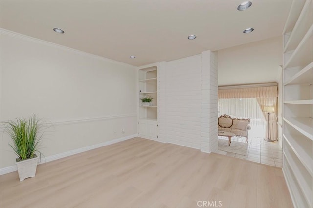 28012 Ridgeforest Ct, Rancho Palos Verdes, CA 90275 - spare room with wood finished floors, recessed lighting, crown molding, and built in features