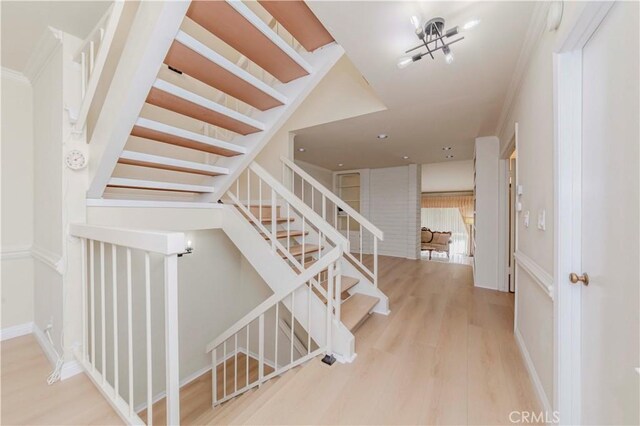 28012 Ridgeforest Ct, Rancho Palos Verdes, CA 90275 - stairs featuring wood finished floors