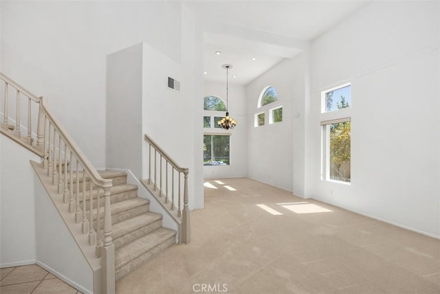 32147 Corte Florecita, Temecula, CA 92592 - entrance foyer with a high ceiling, stairs, a chandelier, carpet floors, and recessed lighting