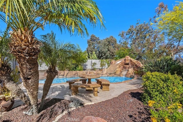 32147 Corte Florecita, Temecula, CA 92592 - view of swimming pool with a water slide and a patio area