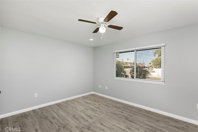 25781 Interlechen Dr, Menifee, CA 92586 - empty room with wood finished floors, baseboards, a ceiling fan, and recessed lighting