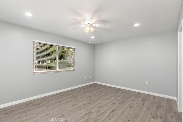 25781 Interlechen Dr, Menifee, CA 92586 - spare room featuring ceiling fan, wood finished floors, baseboards, and recessed lighting