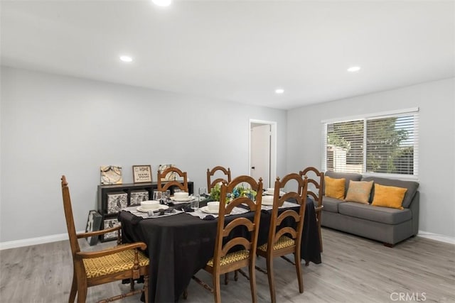 25781 Interlechen Dr, Menifee, CA 92586 - dining space with light wood-type flooring, recessed lighting, and baseboards