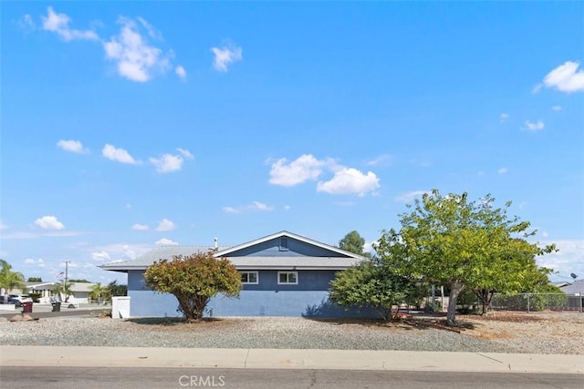 25781 Interlechen Dr, Menifee, CA 92586 - view of front of property featuring stucco siding