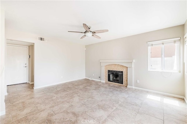 24701 New Haven Dr, Murrieta, CA 92562 - unfurnished living room featuring a ceiling fan, a fireplace, and baseboards