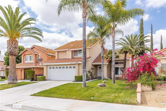 24701 New Haven Dr, Murrieta, CA 92562 - mediterranean / spanish-style house featuring stucco siding, driveway, a tile roof, a front lawn, and an attached garage